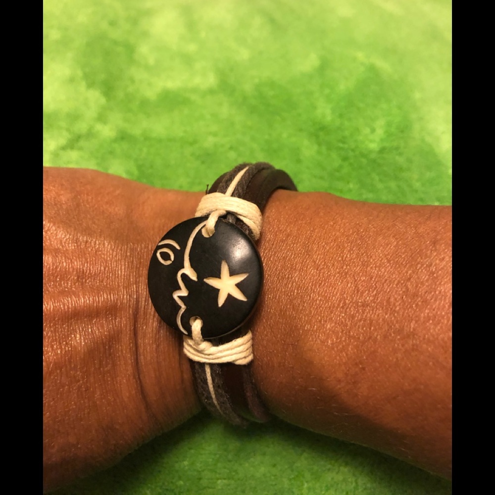 Leather bracelet.